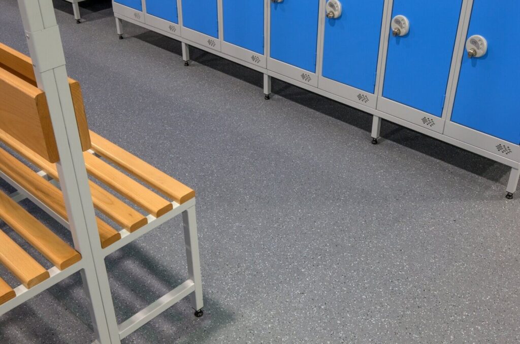 Leisure centre changing room with vinyl flooring