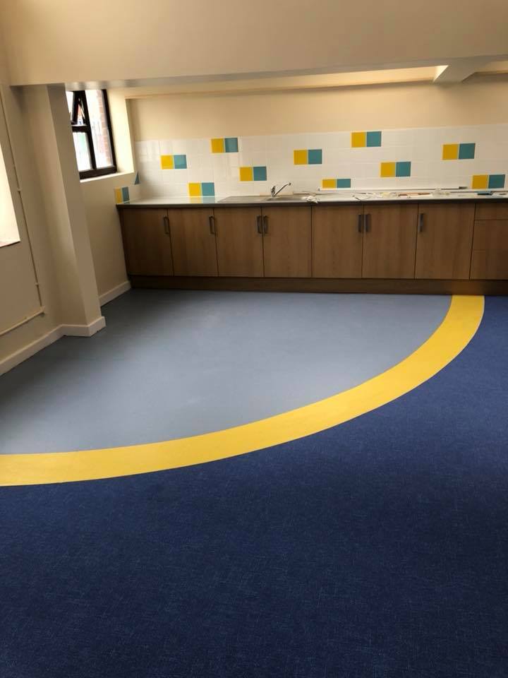 School kitchen area with vinyl floor