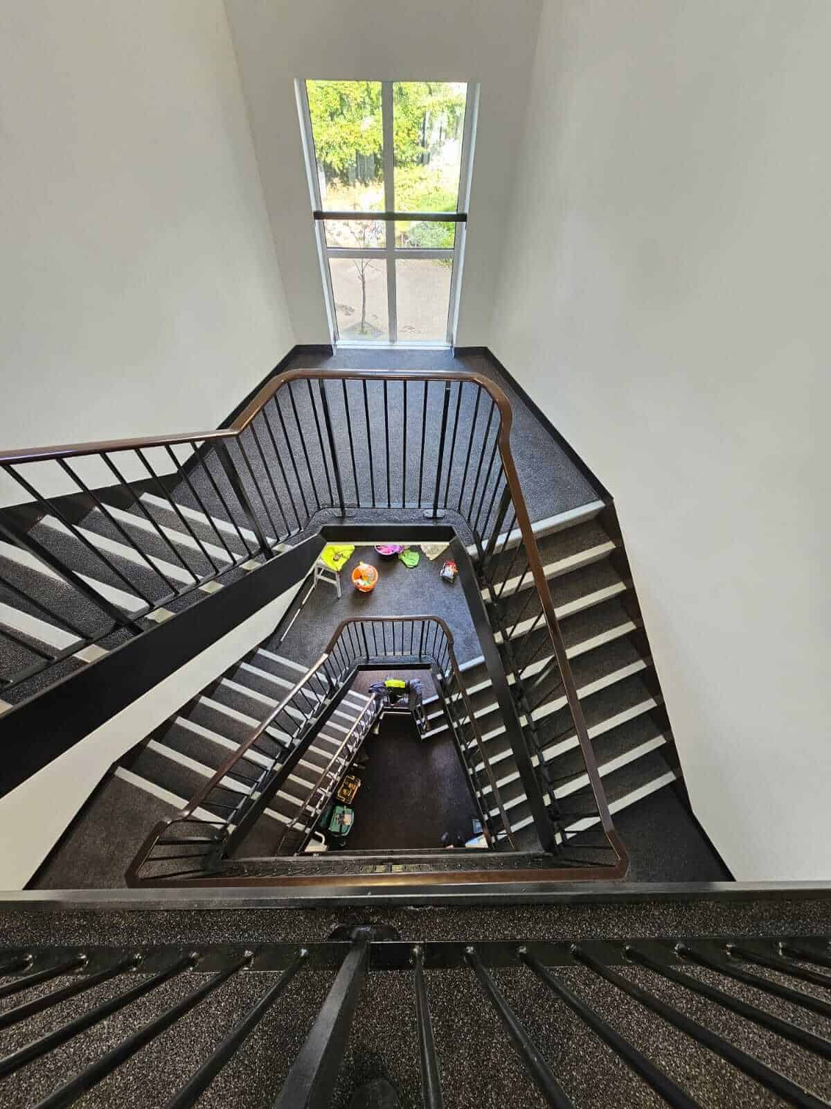 Carpeted staircase in student accommodation block