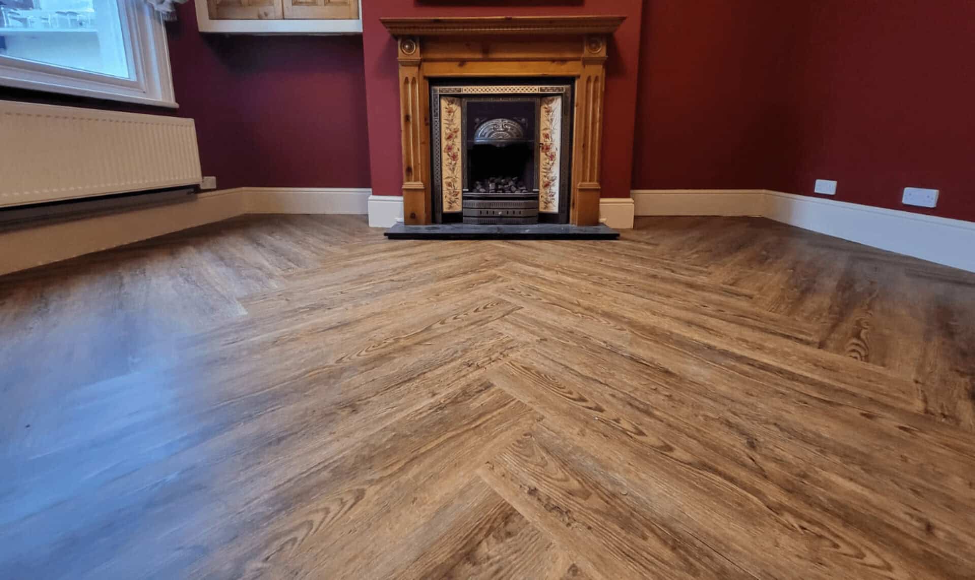 A home living with luxury vinyl tile in a herringbone design