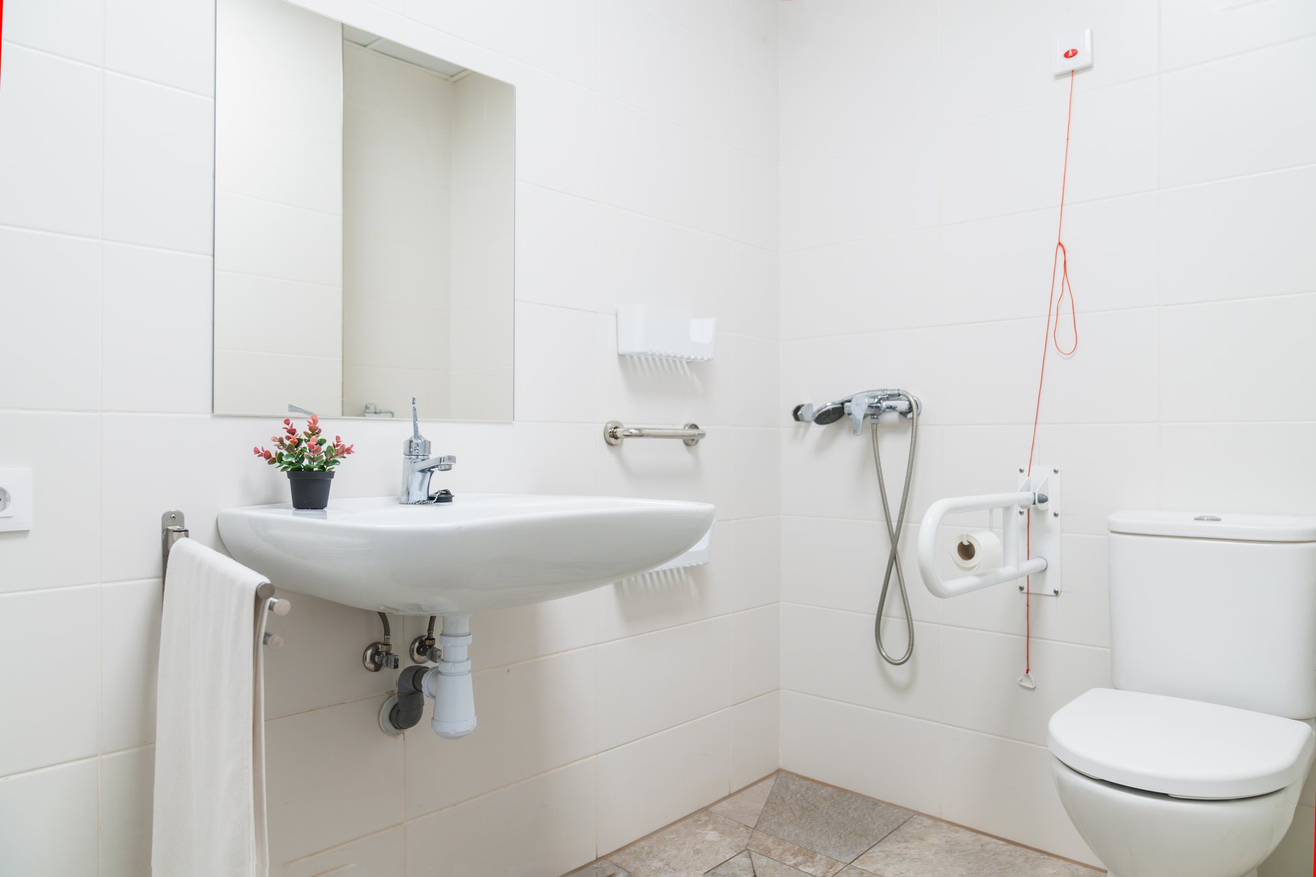 Accessible wet room with slip-resistant vinyl flooring